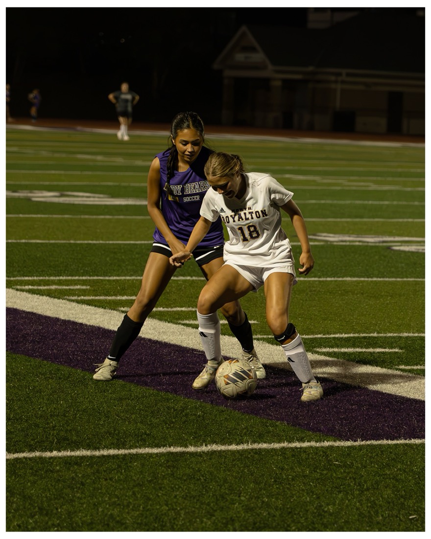 Night soccer duel under the lights