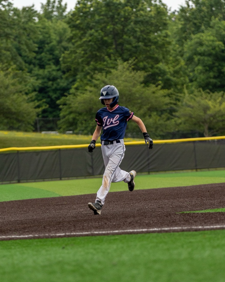 Baseball baserunner rounding the bases